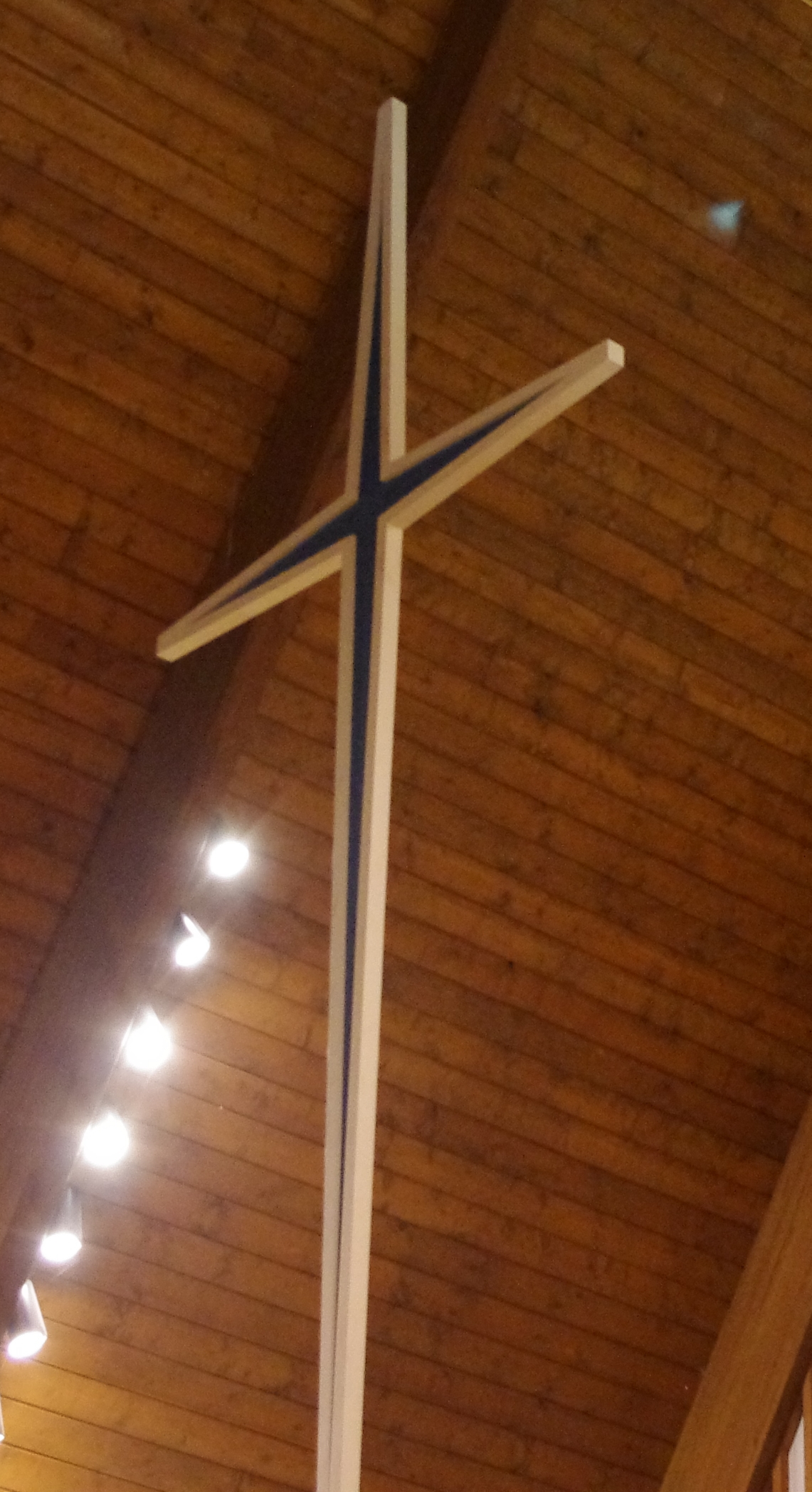 Blue cross in church sanctuary