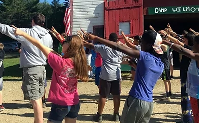 Young campers dancing at Camp Wilmot