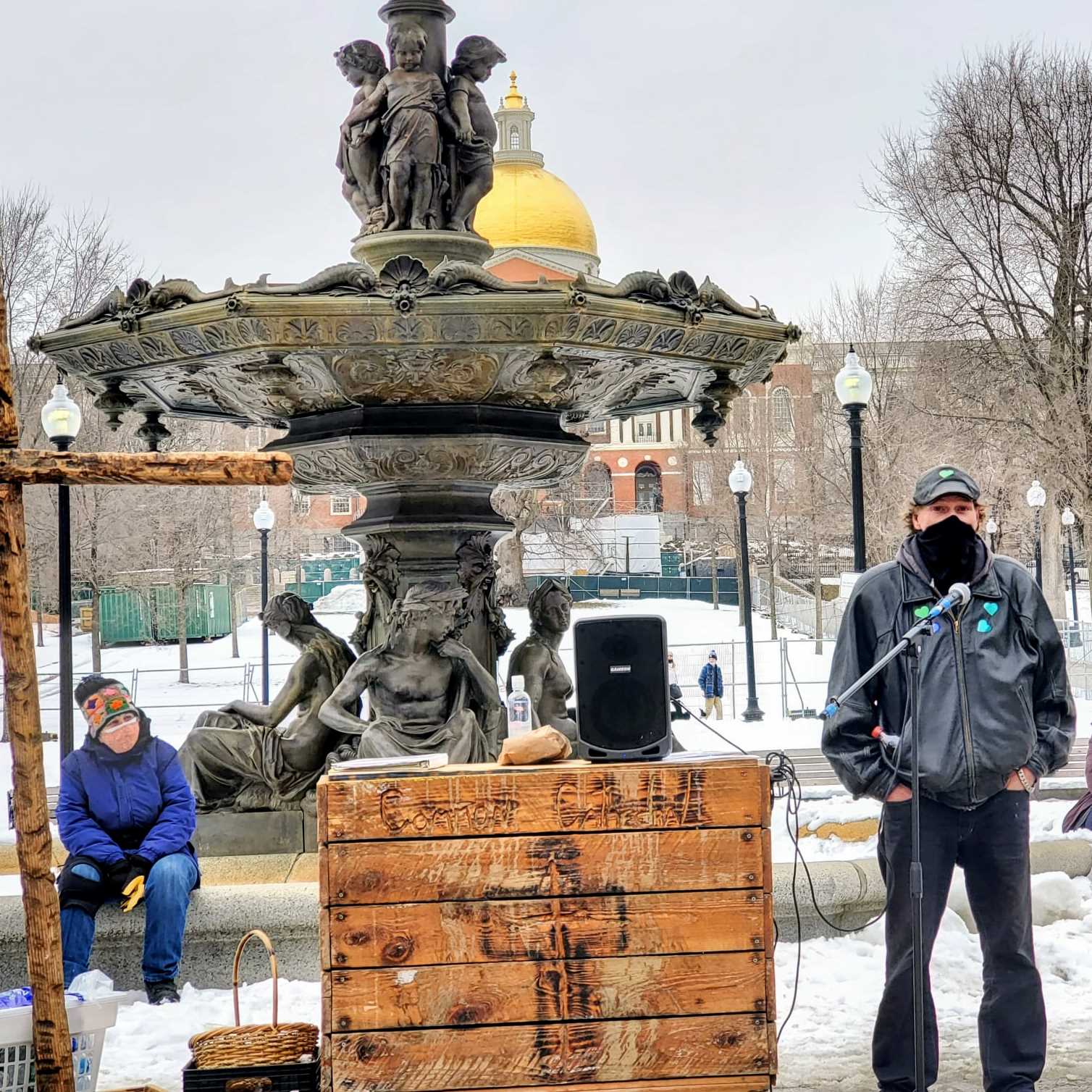 Outdoor worship service near fountain on Boston Common