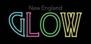 "New England GLOW" in neon letters
