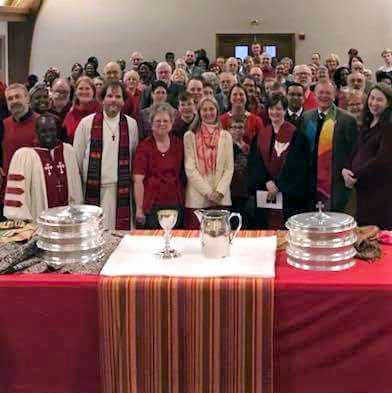 Full sanctuary, table set for communion