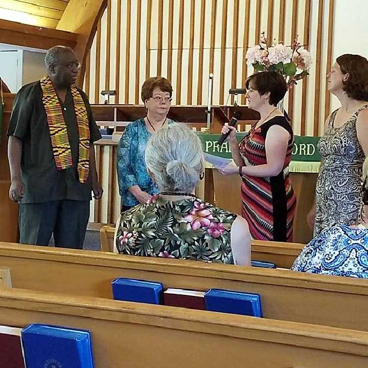 New members at front of sanctuary